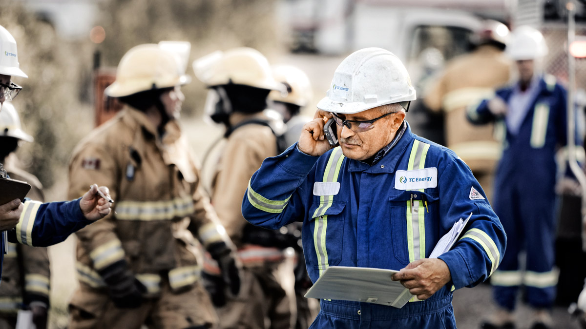 Man and woman monitoring pipelines.